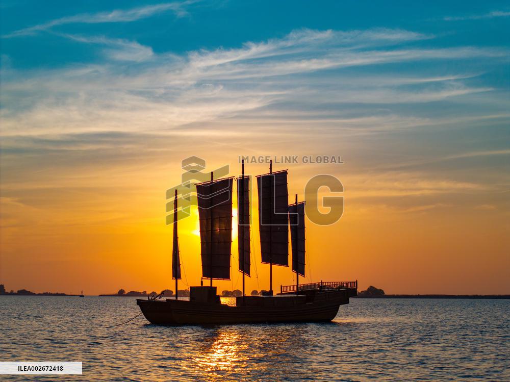 Sailboats in The Sunset Glow in Huai 'an