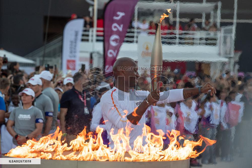 Olympic And Paralympic Torch Relays - Didier Drogba Holds The Olympic Torch
