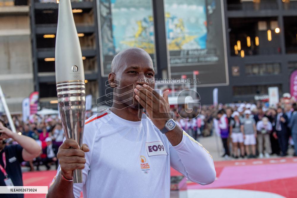 Olympic And Paralympic Torch Relays - Didier Drogba Holds The Olympic Torch