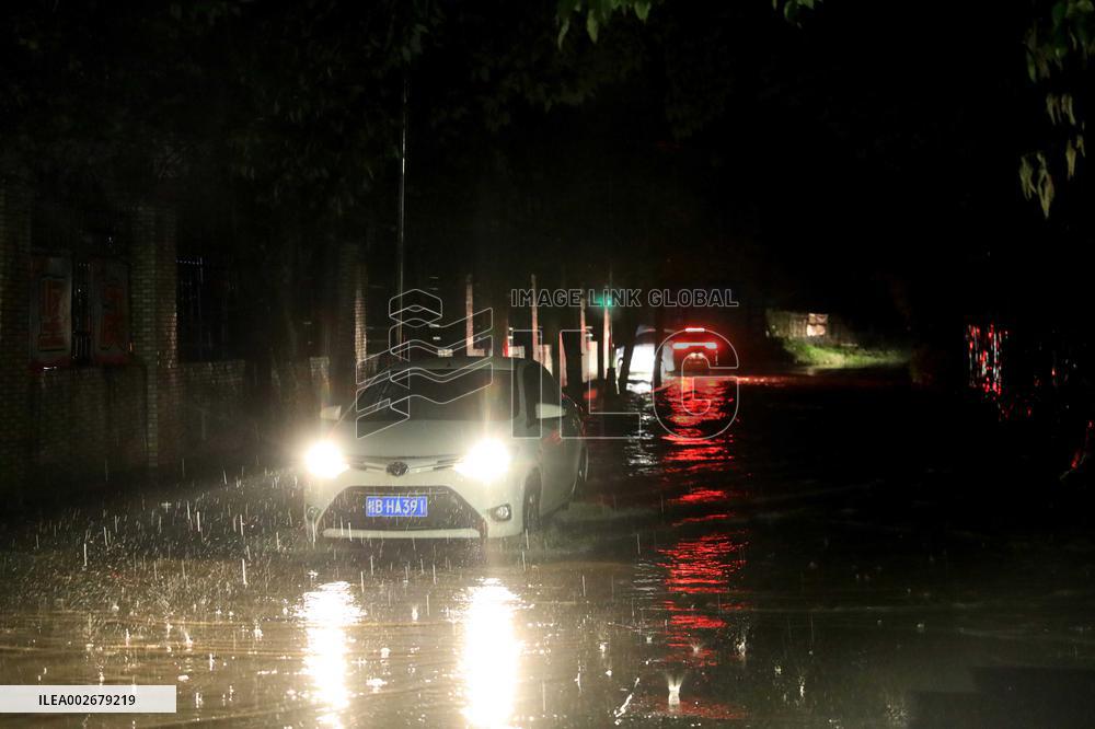 Daily Life During Rainstorm in Liuzhou