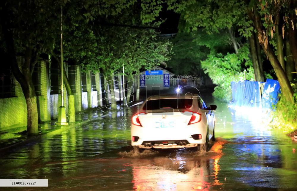 Daily Life During Rainstorm in Liuzhou