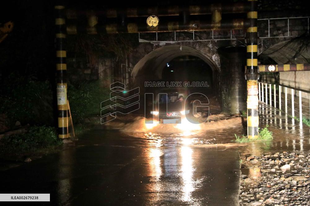 Daily Life During Rainstorm in Liuzhou