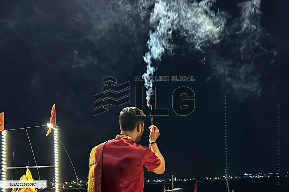 Hindu Priests Performing Evening Prayers at Ganges River