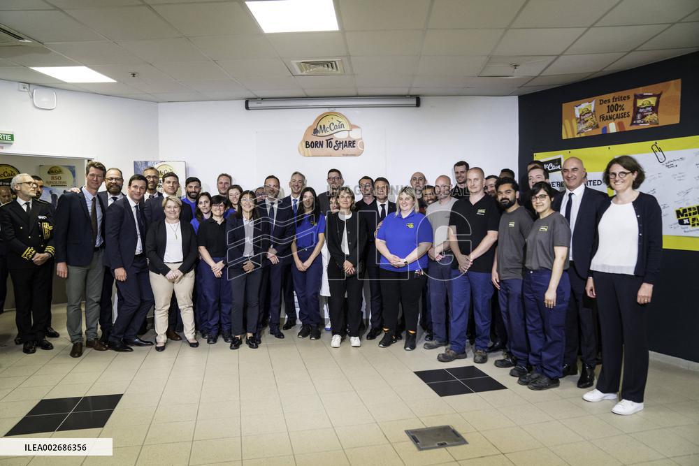 Emmanuel Macron Visits A McCain Factory In The Marne Region