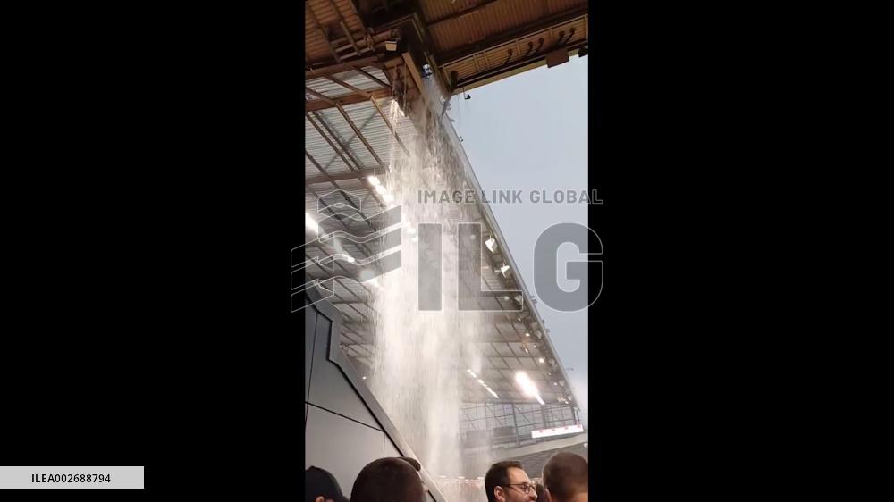 UK: Large Volume Of Rain Water Cascades Through Leaky Roof At Old Trafford Stadium