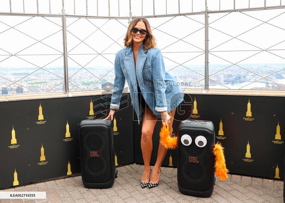 Chrissy Teigen Visits The Empire State Building - NYC