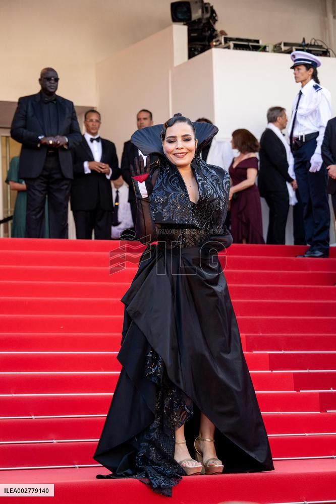 Cannes - Asmae El Moudir with Palestine Flag at Closing Ceremony AAR