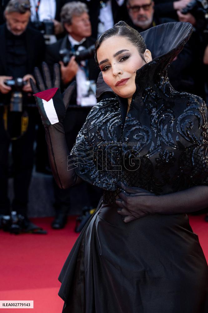 Cannes - Asmae El Moudir with Palestine Flag at Closing Ceremony AAR