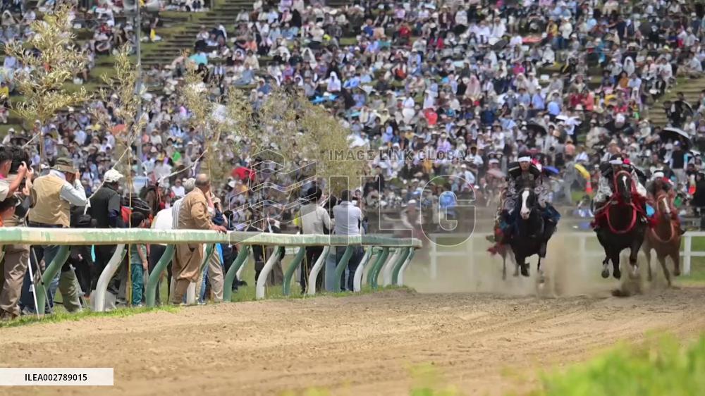 Armored warriors compete in horse race