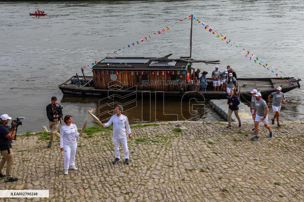 Olympic Flame Passes Through Maine Et Loire - France