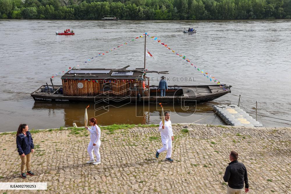 Olympic Flame Passes Through Maine Et Loire - France