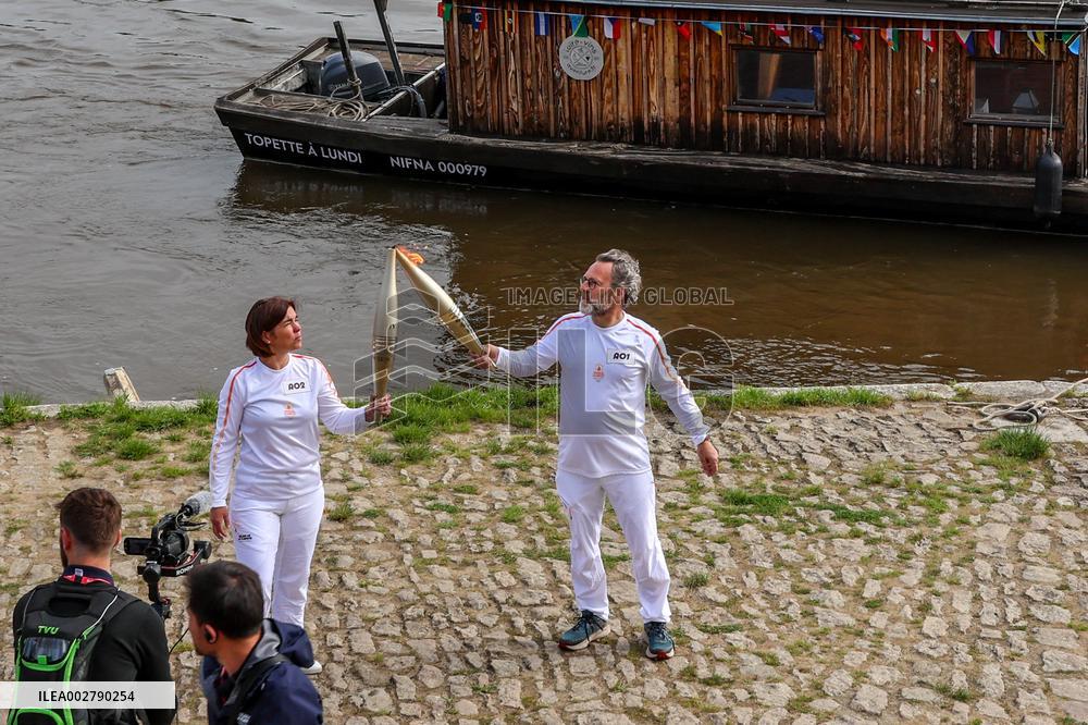 Olympic Flame Passes Through Maine Et Loire - France