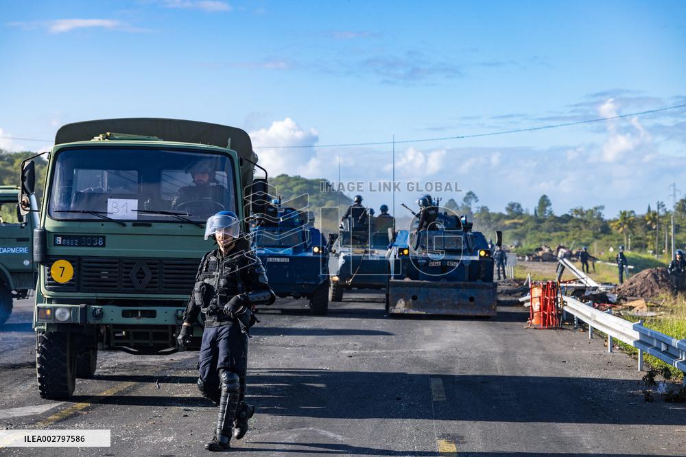 Gendarmes Clear A Roadblock - New Caledonia