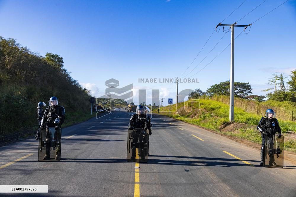 Gendarmes Clear A Roadblock - New Caledonia