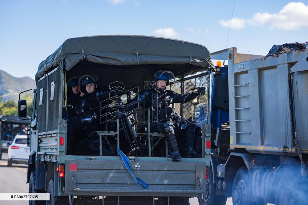 Gendarmes Clear A Roadblock - New Caledonia