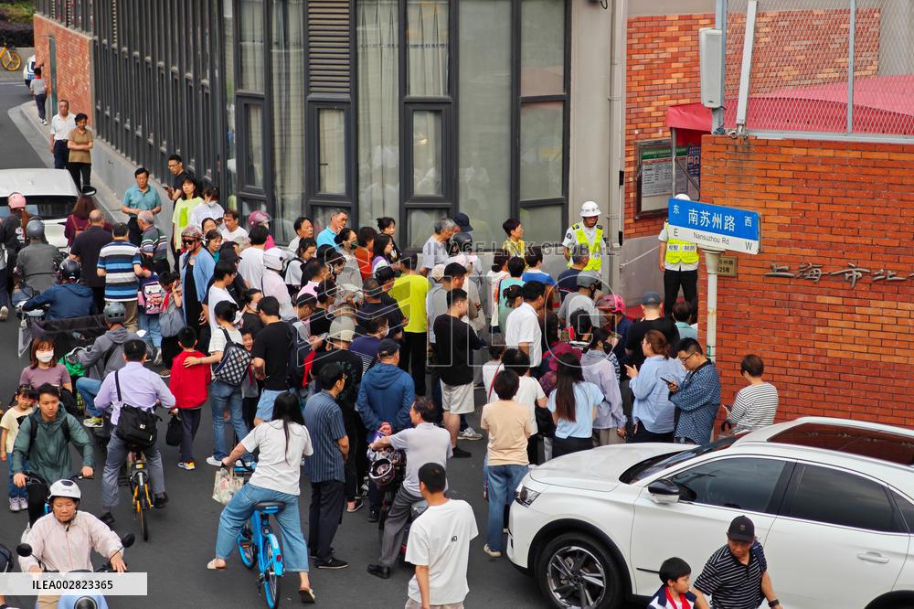 Chinese Picking up Children