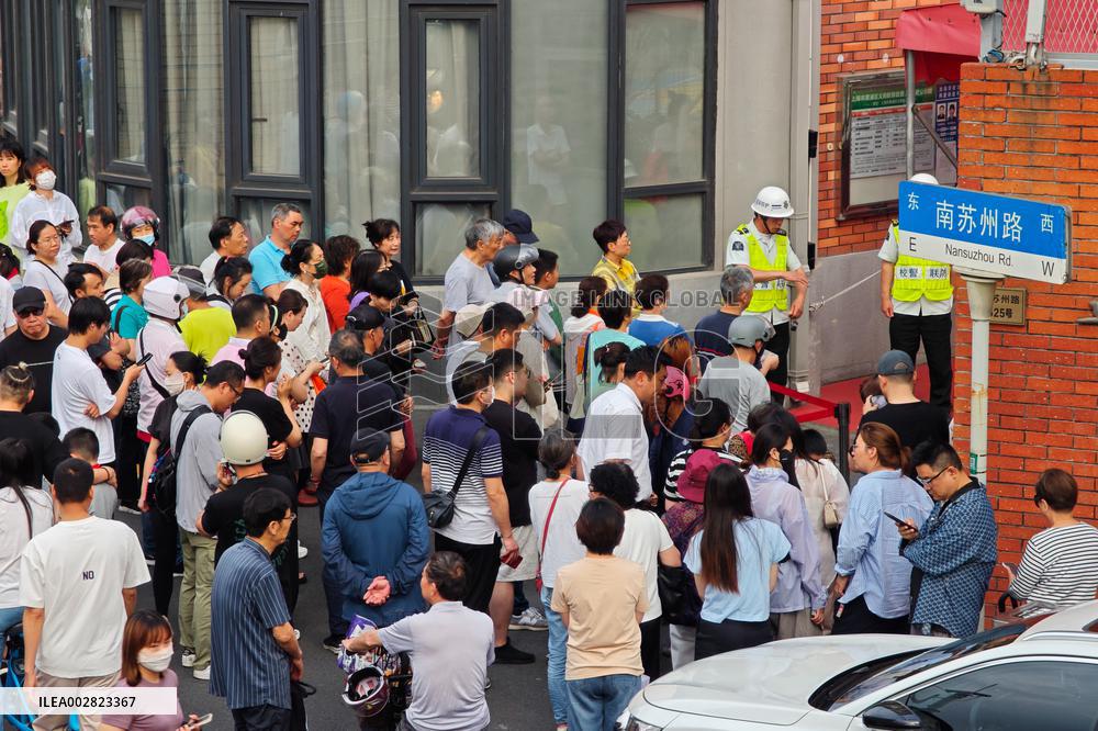 Chinese Picking up Children