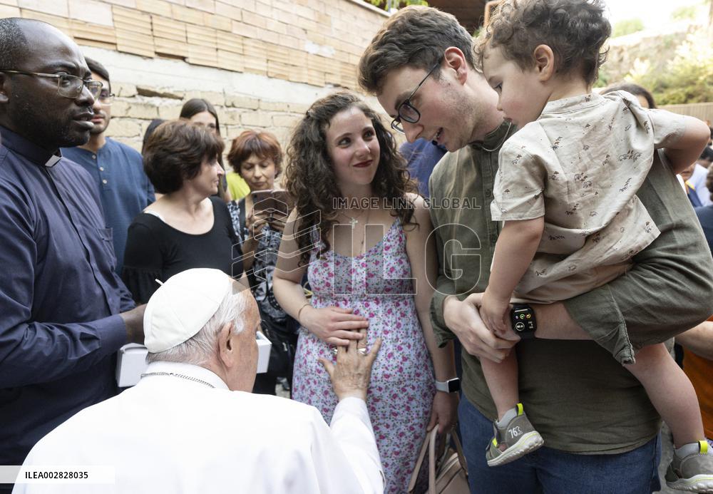 Surprise Visit of Pope Francis To Families In Garage of A Building - Rome