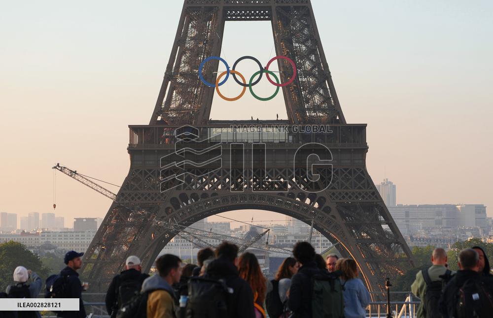 Olympic rings mounted on Eiffel Tower