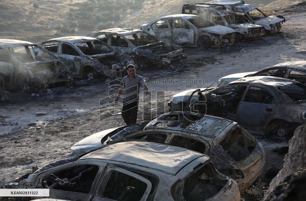 MIDEAST-RAMALLAH-CARS-FIRE