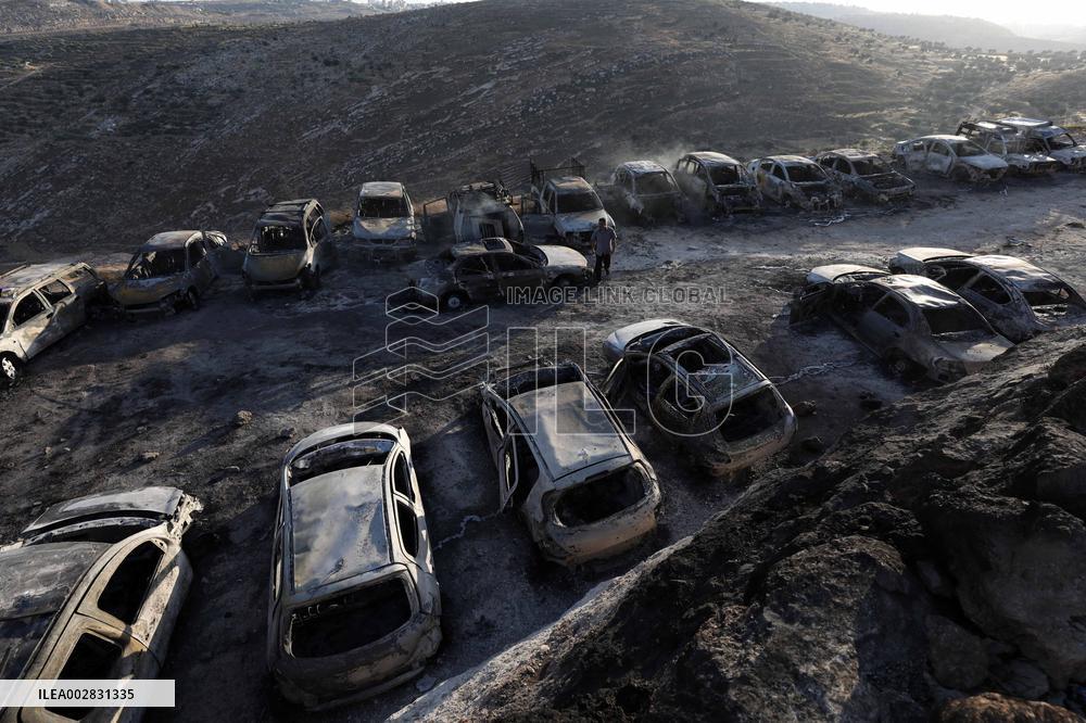 MIDEAST-RAMALLAH-CARS-FIRE