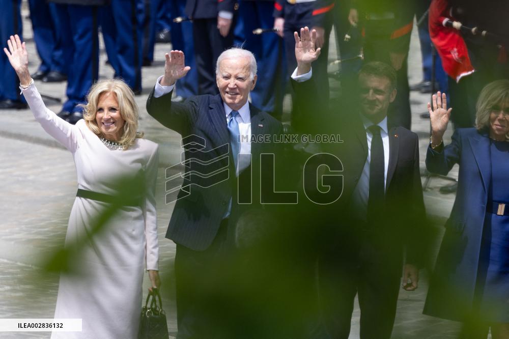 Joe Biden takes part in a Ceremony at the Arc de Triomphe - Paris