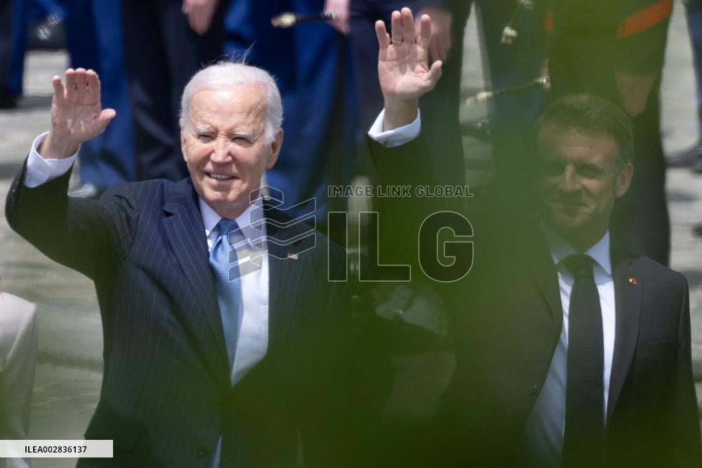 Joe Biden takes part in a Ceremony at the Arc de Triomphe - Paris