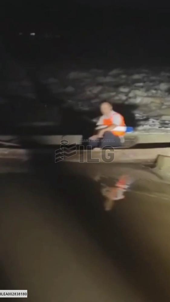 Firefighters rescue trapped man in Guangxi, China