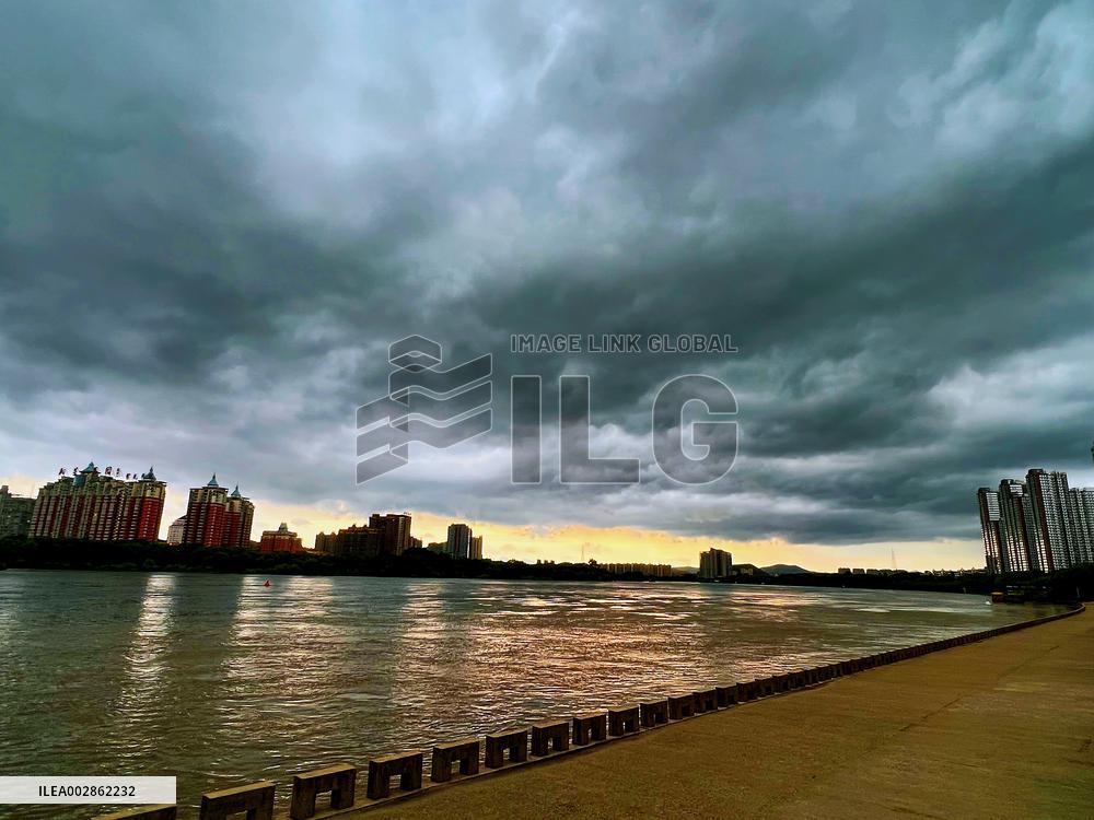 Songhua River Under Dark Clouds in Jilin