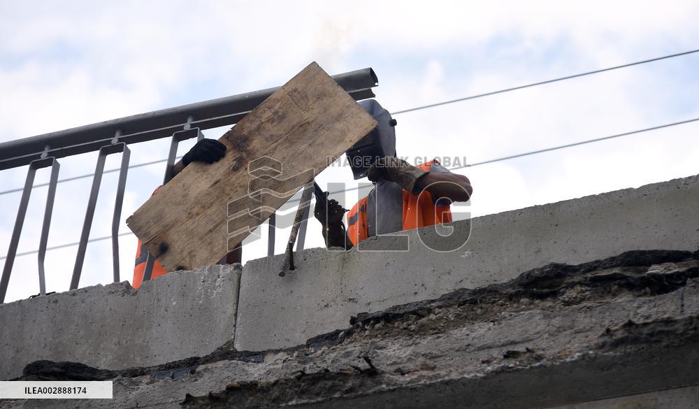 Pedestrian section of Povitroflotskyi Overpass collapses in Kyiv