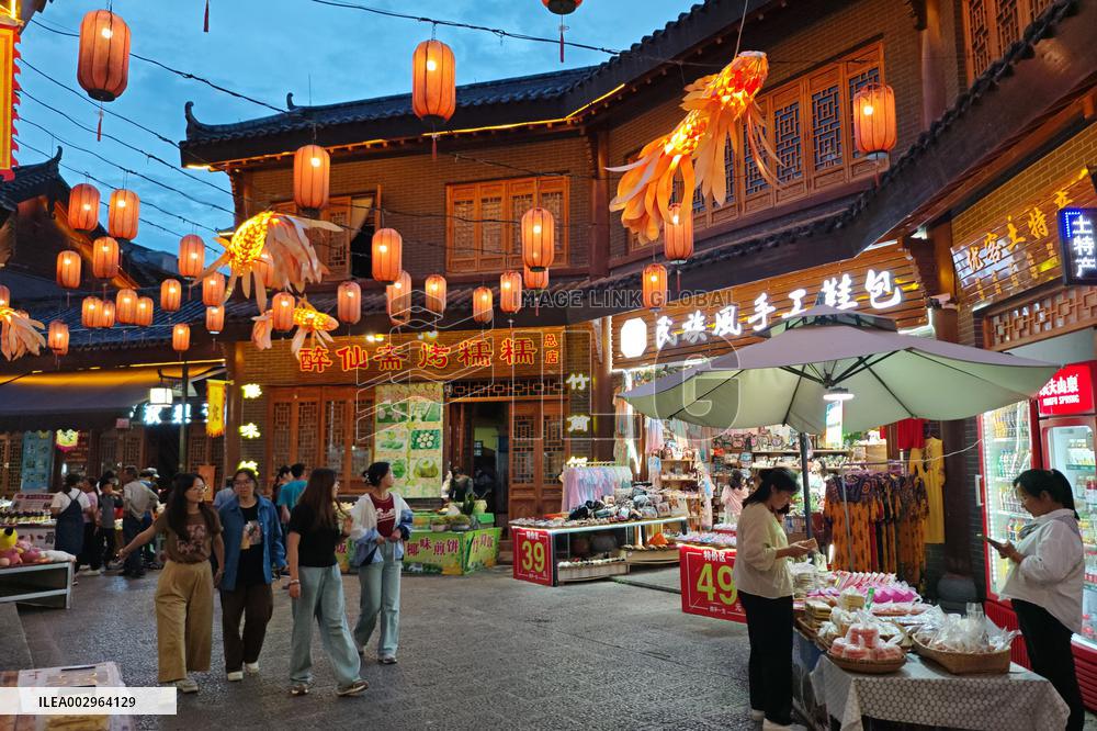 Tourists Enjoy Tea Horse Ancient City in Pu 'er