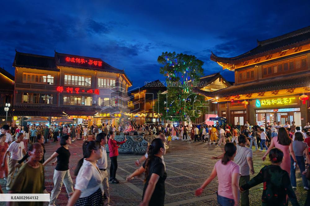 Tourists Enjoy Tea Horse Ancient City in Pu 'er