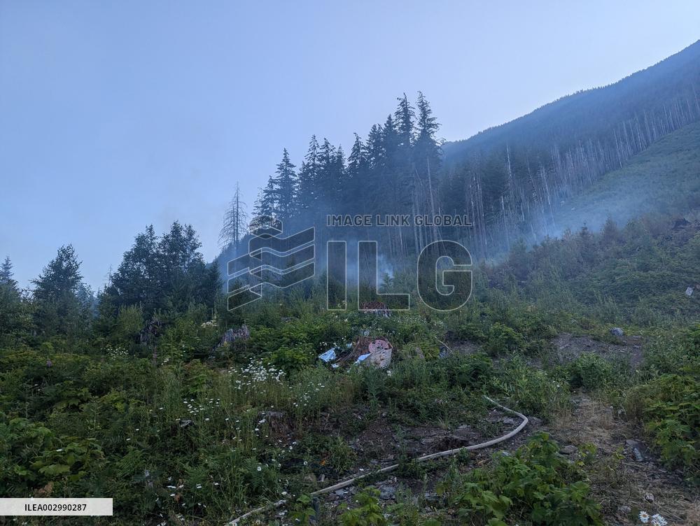 Wildfire Continues To Burn In Hills Above Peachland - British Columbia