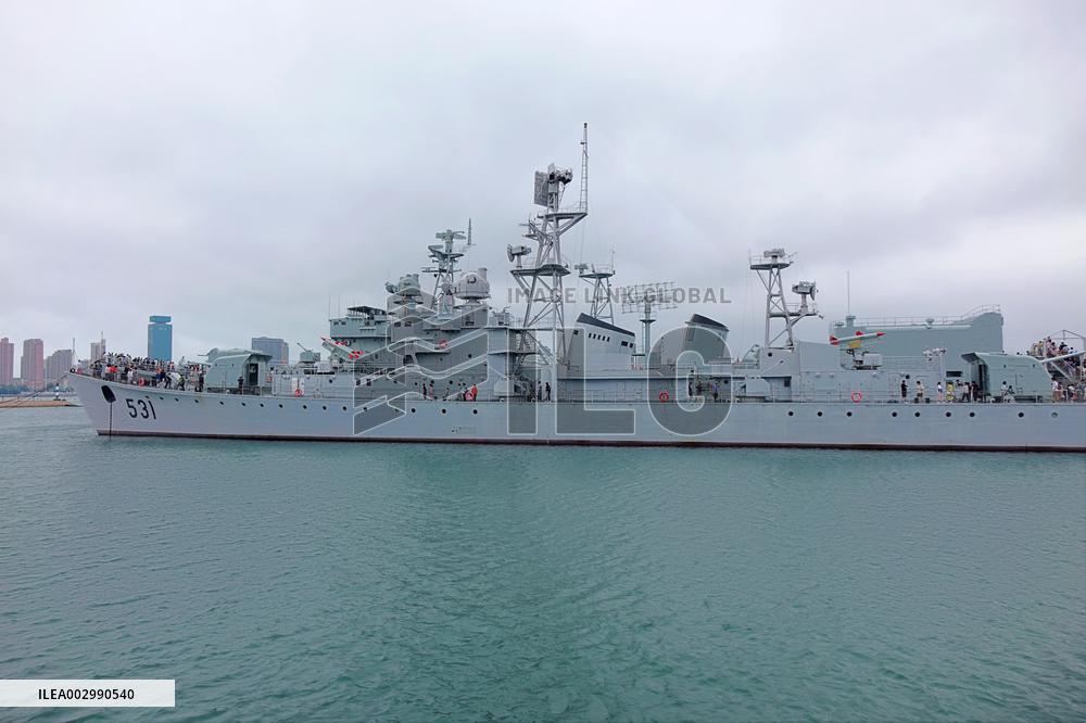 Tourists Visit A Decommissioned Warship in Qingdao