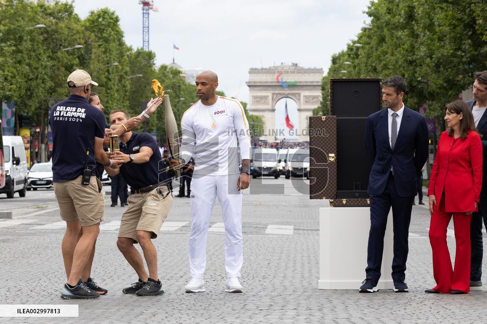 Olympic Torch Relay Along the Champs-Elysees Avenue - Paris