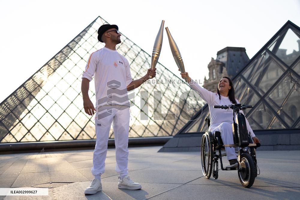 Olympic Torch Relay at the Louvre Pyramid- Paris