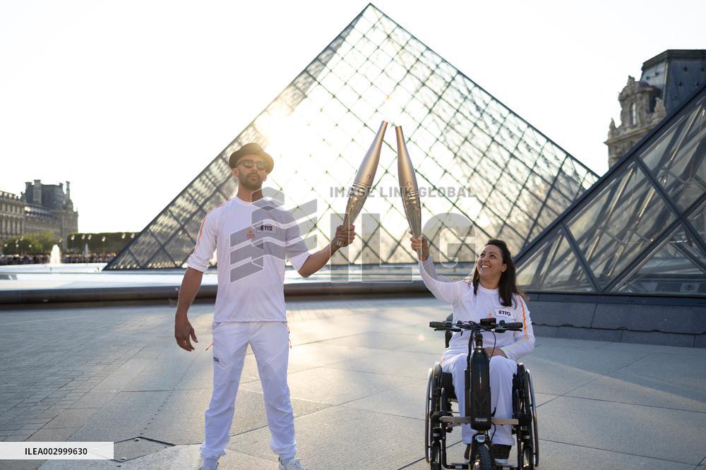 Olympic Torch Relay at the Louvre Pyramid- Paris
