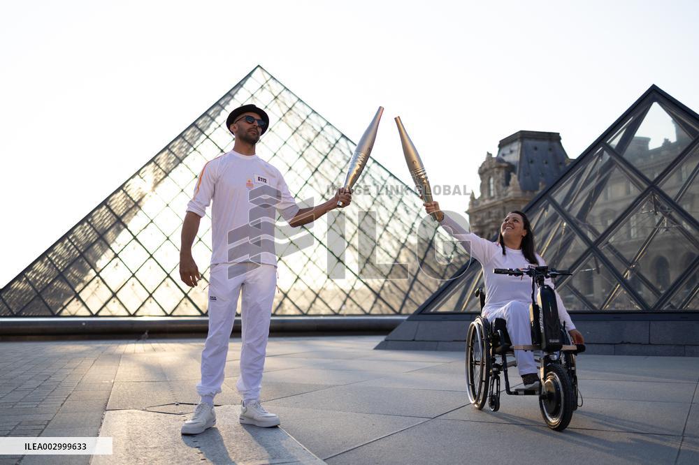 Olympic Torch Relay at the Louvre Pyramid- Paris