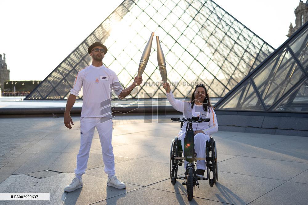 Olympic Torch Relay at the Louvre Pyramid- Paris