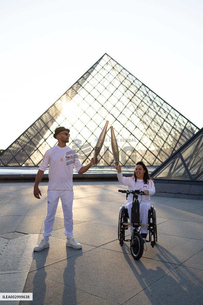 Olympic Torch Relay at the Louvre Pyramid- Paris