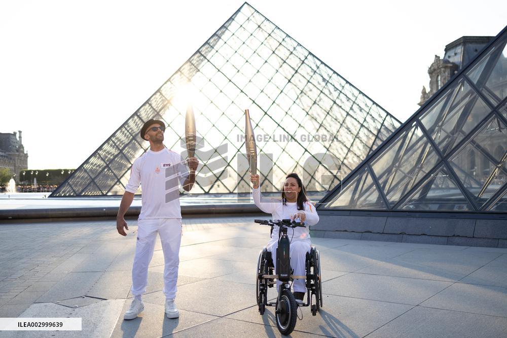 Olympic Torch Relay at the Louvre Pyramid- Paris