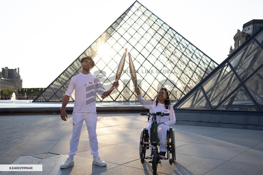 Olympic Torch Relay at the Louvre Pyramid- Paris