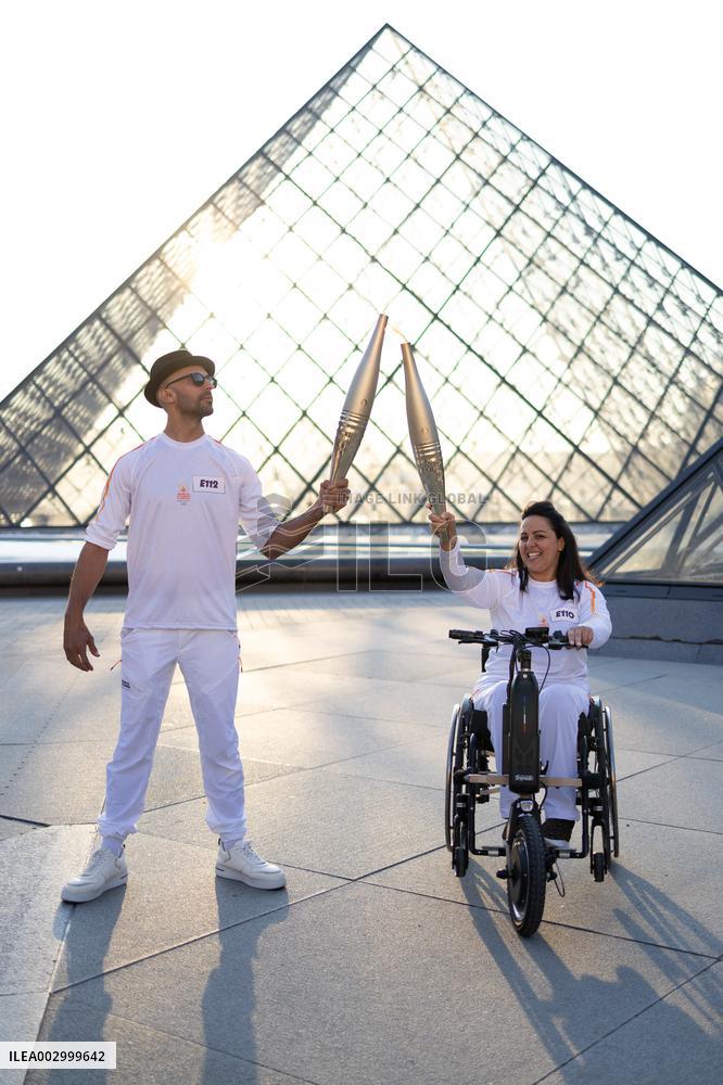 Olympic Torch Relay at the Louvre Pyramid- Paris