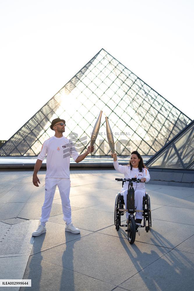 Olympic Torch Relay at the Louvre Pyramid- Paris