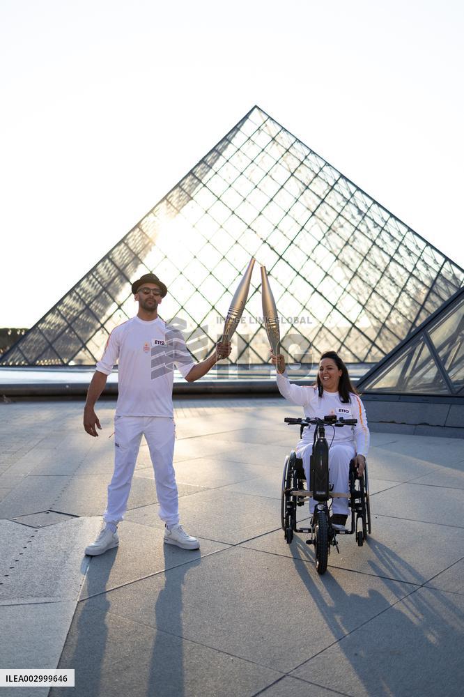 Olympic Torch Relay at the Louvre Pyramid- Paris
