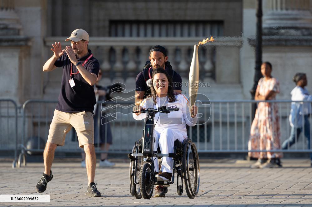 Olympic Torch Relay at the Louvre Pyramid- Paris