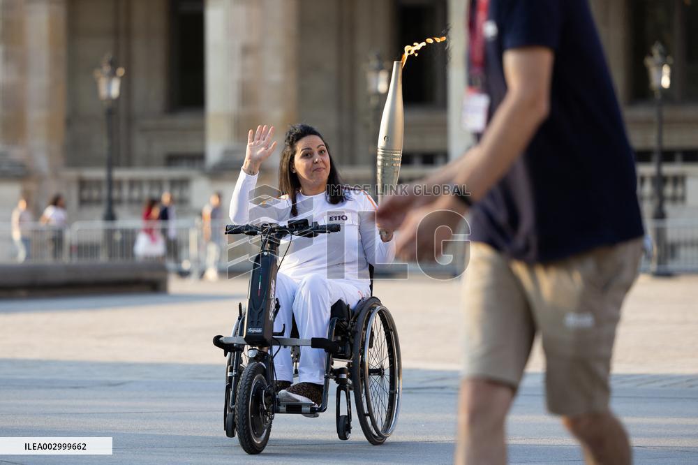 Olympic Torch Relay at the Louvre Pyramid- Paris