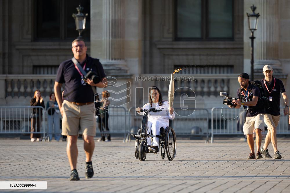 Olympic Torch Relay at the Louvre Pyramid- Paris