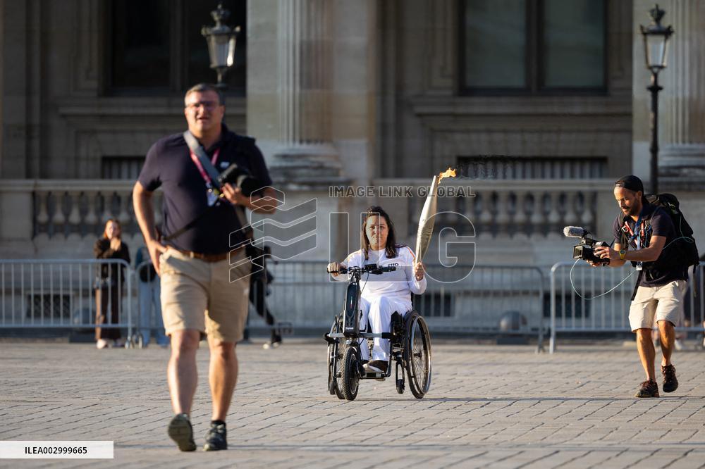 Olympic Torch Relay at the Louvre Pyramid- Paris