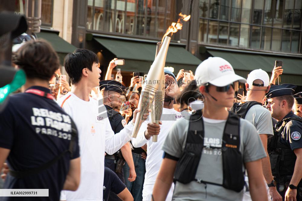Kim Seok-jin with The Olympic torch - Paris